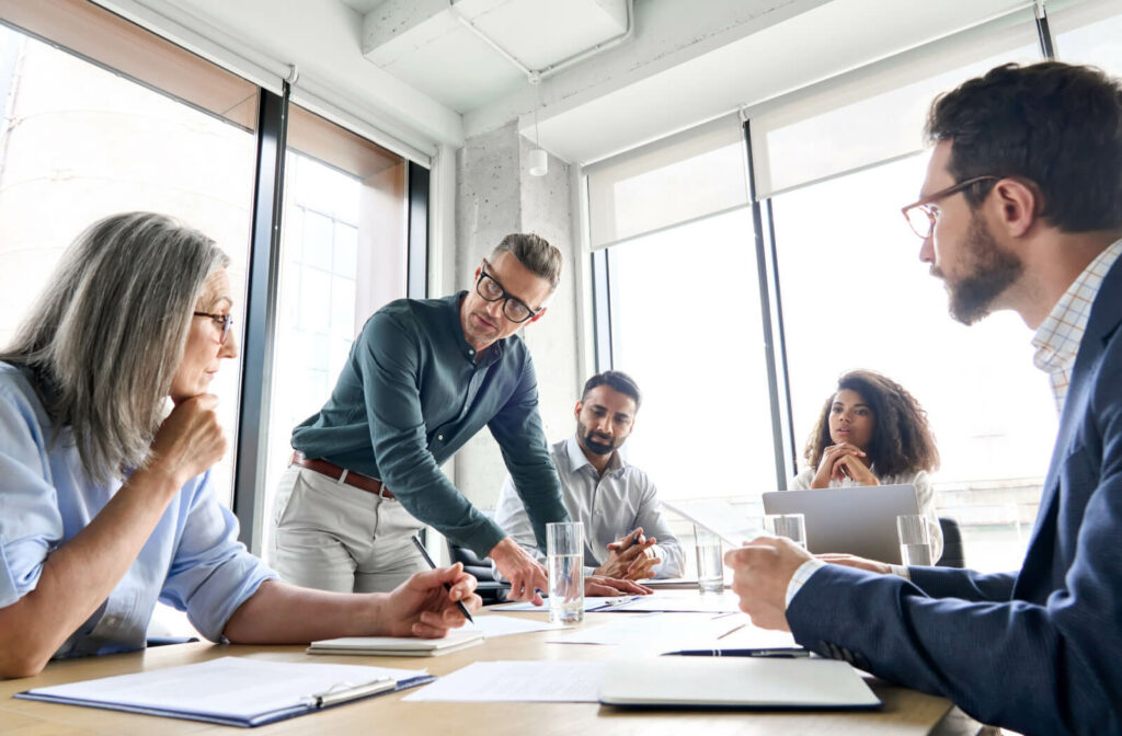 Group of professionals planning a senior living community
