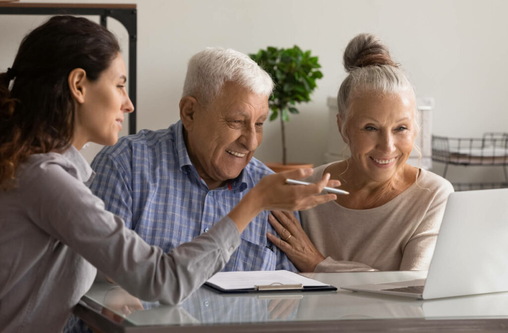 a group of seniors speak with a senior living consultant